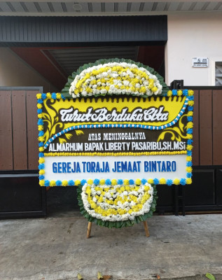 Papan Bunga Duka di Handil Bakti